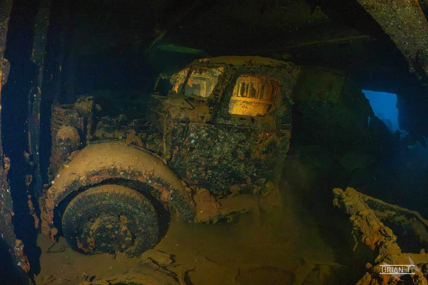 The heavy wheels and cab of a vehicle in a Truk Lagoon wreck